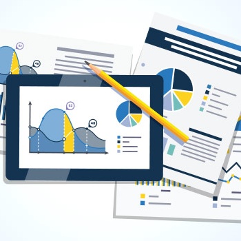 documents spread beneath a tablet, all containing graphs and data